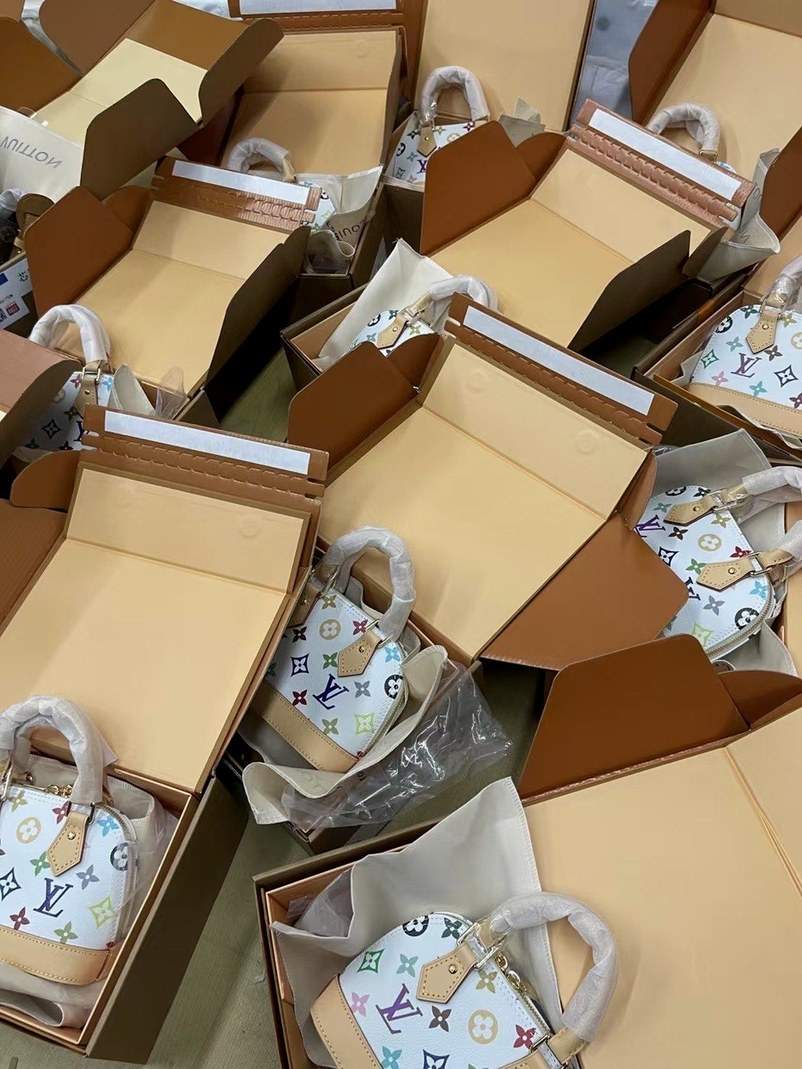 Bags individually boxed and wrapped, packed for dispatch
